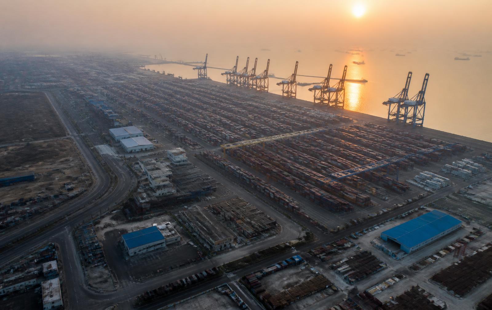 Aerial view of Indian port infrastructure at dawn